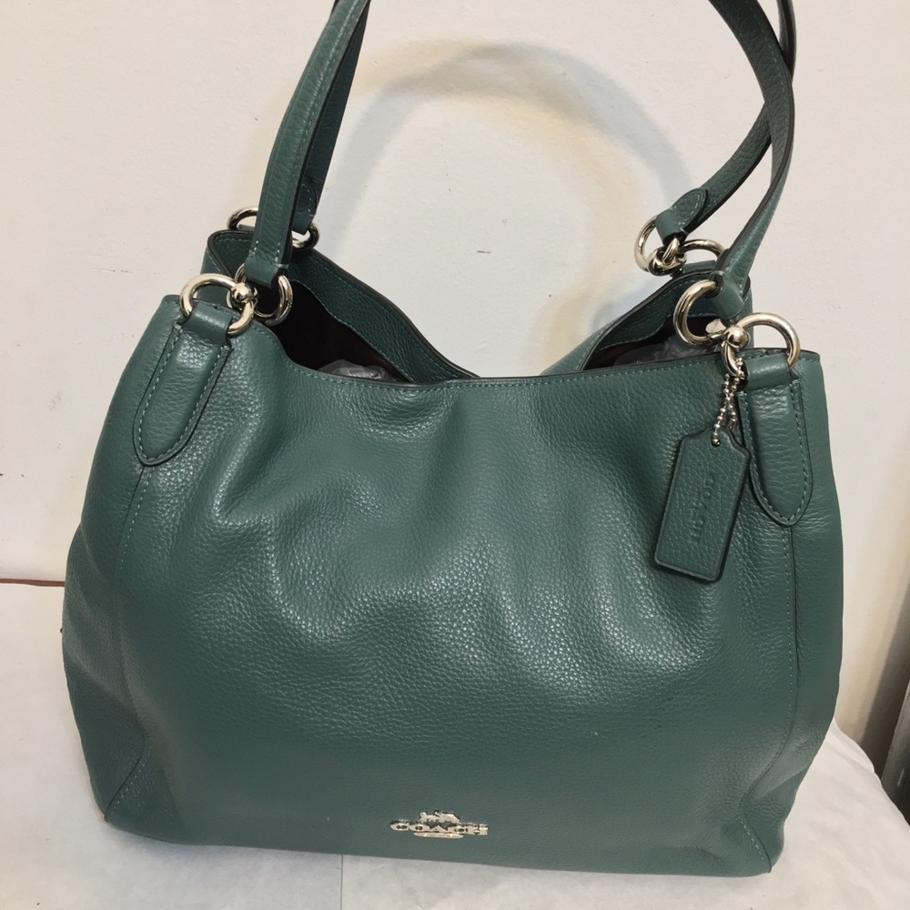 Coach Hallie Pebble Leather Shoulder Bag. Dimensions 4x10x14. New. Color is Teal